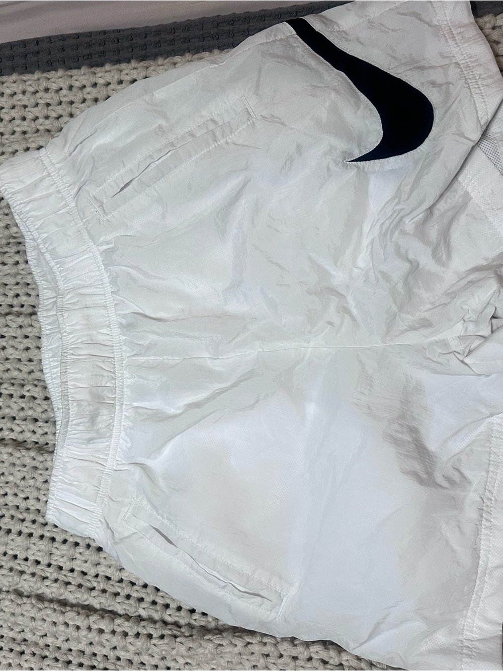 Nike White Athletic Shorts with Black Swoosh Accent